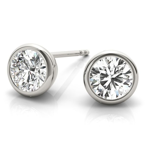showcasing custom designed diamond stud earrings